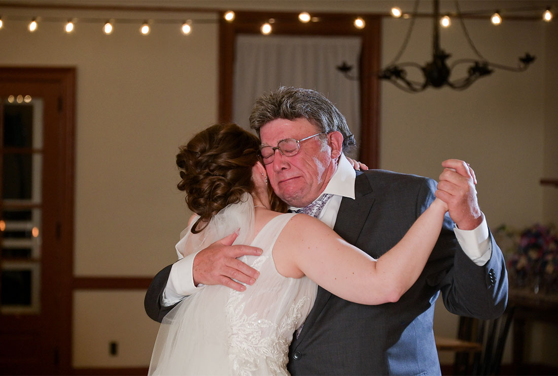 The bride dances with her father after her wedding at the Henry Ford Museum in Dearborn, Michigan.