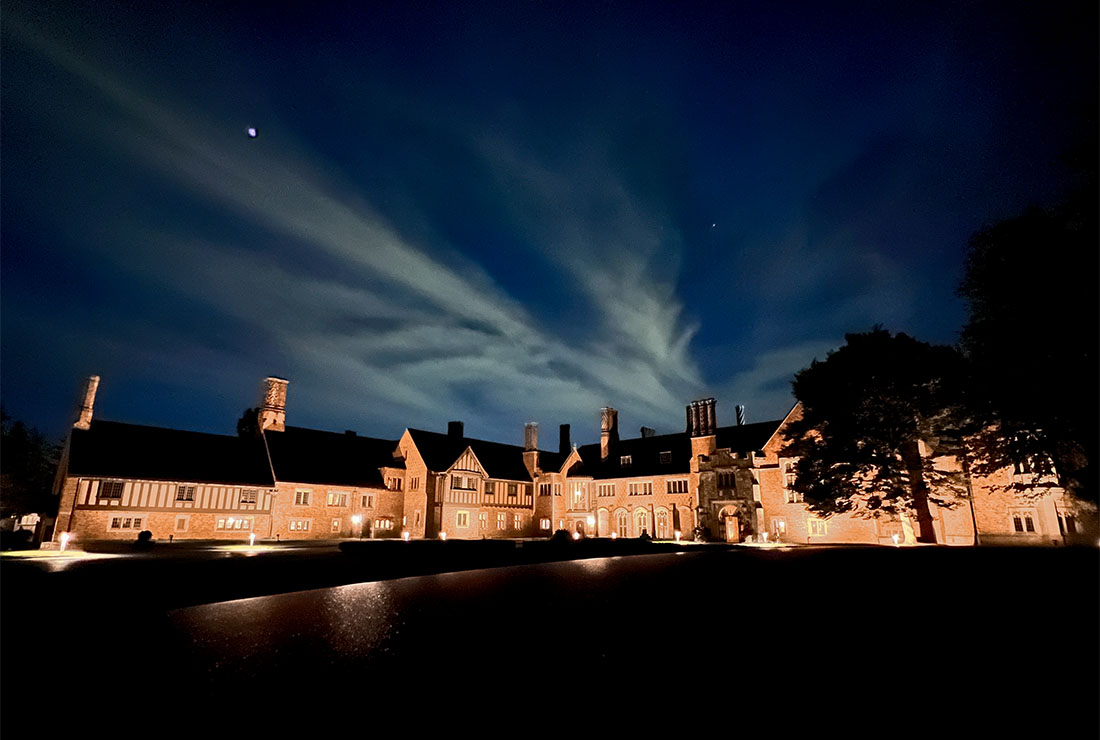 Meadowbrook Hall reflected in a spook fall night sky in Rochester, Michigan.