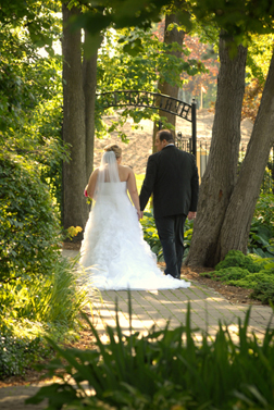 The bride and groom leave the Macomb County, Michigan park
