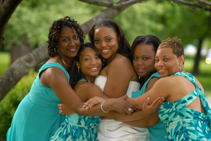 The bridesmaids pose for a photo in Pleasant Ridge, MIchigan