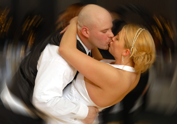 Sterling Heights couple snuggle during their first dance