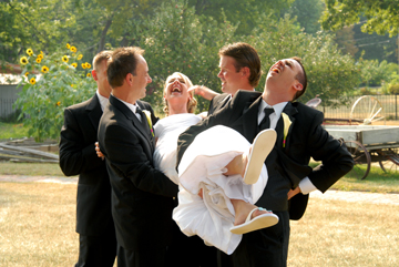 The groomsmen fake a broken back after lifting the bride at the Troy Historic Society.