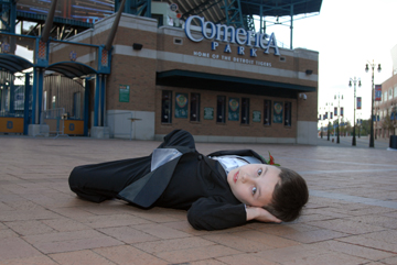 Joe's son plops down on the pavement at Comerica Park