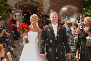 Michigan wedding photographer gets praise from MSU bride and groom.