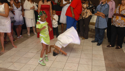 Kids dance at the wedding reception.