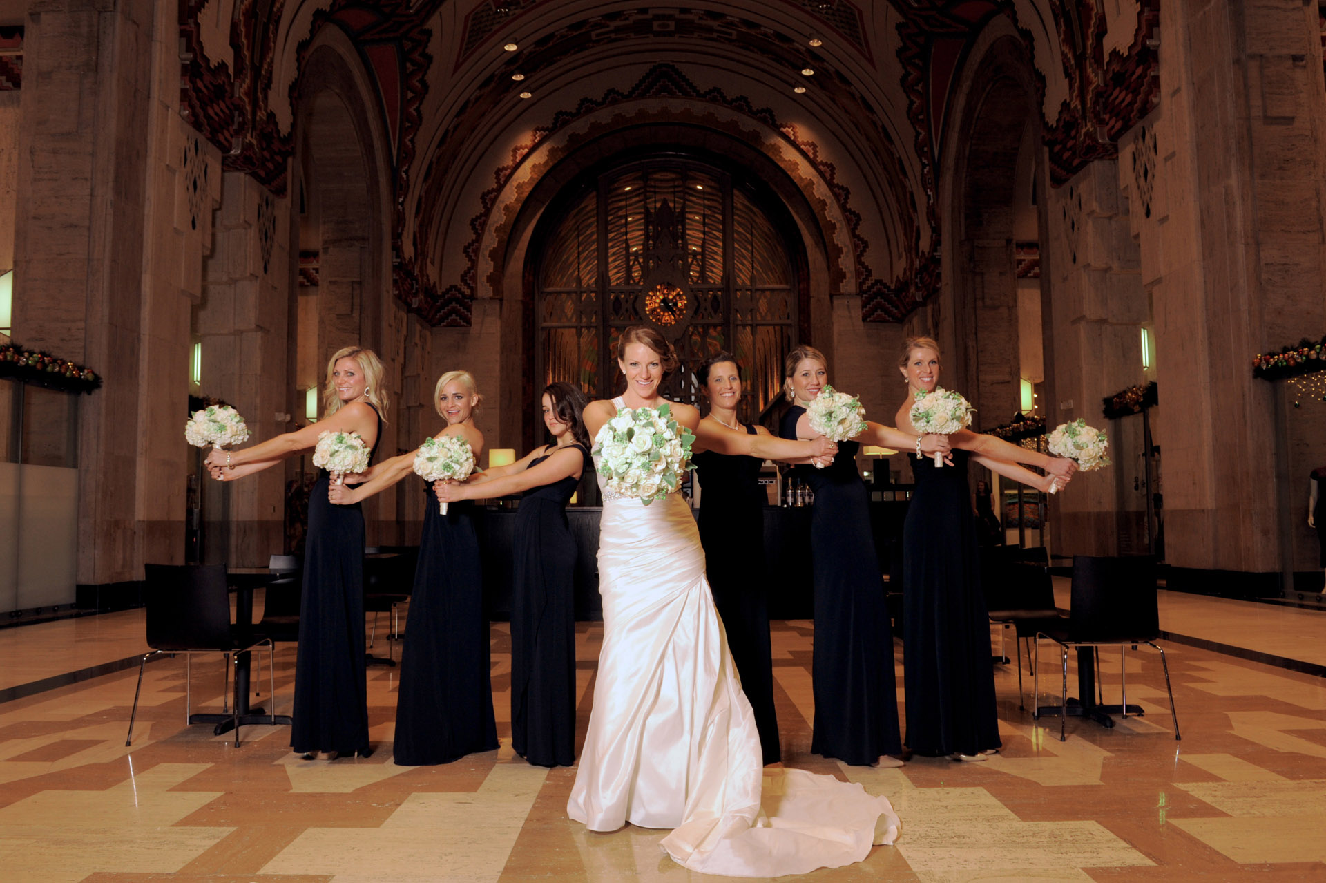 The Historic church Sweetest Heart of Mary and the Dearborn Inn of Detroit's historic church in Detroit and Dearborn, Michigan wedding photographer's photo of the bride and her bridesmaids at the historic Guardian building for wedding photos in Detroit, Michigan.