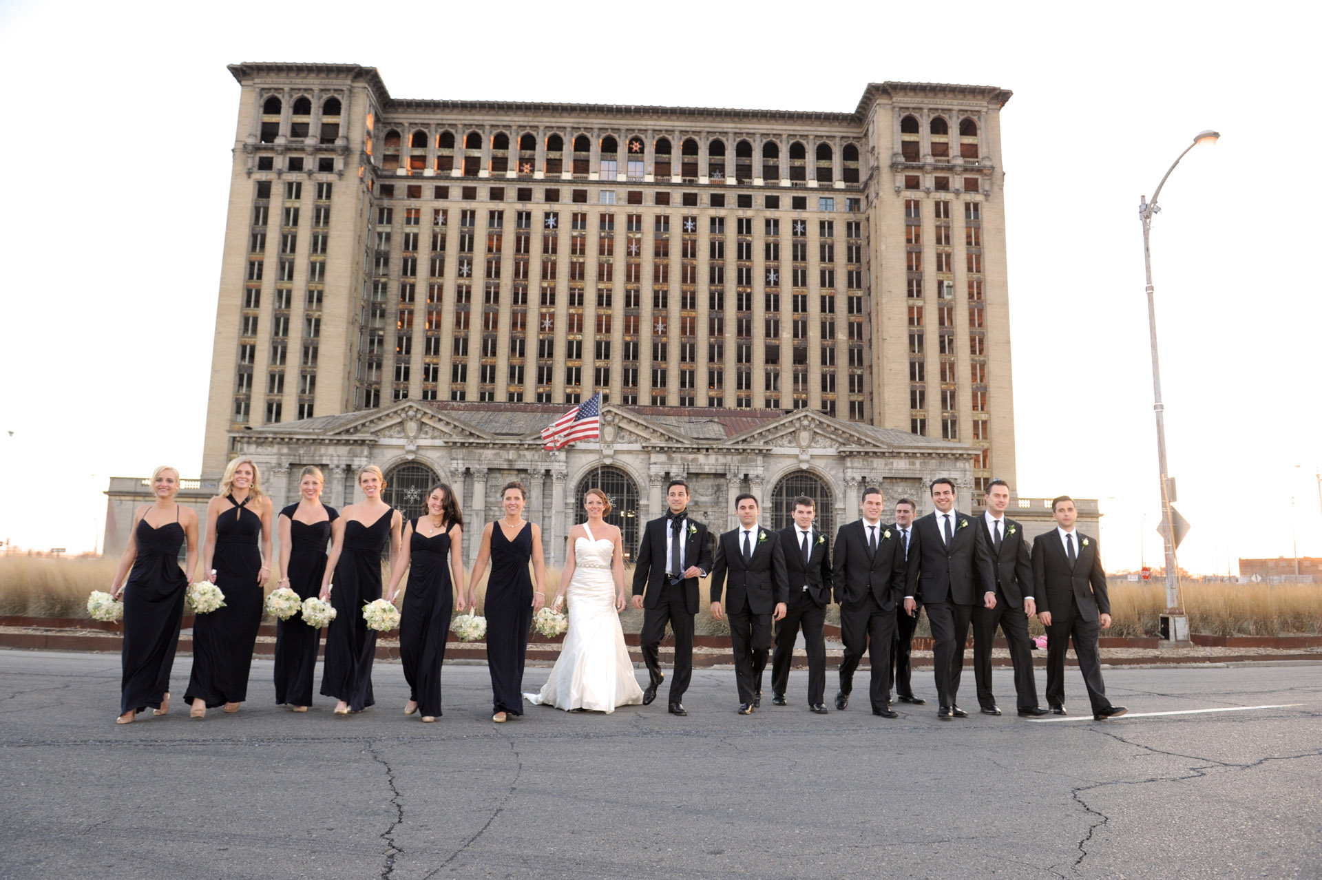 The Historic church Sweetest Heart of Mary and the Dearborn Inn of Detroit's historic church in Detroit and Dearborn, Michigan wedding photographer's photo of the photo of the wedding party at Detroit's historic train station for wedding photos in Detroit, Michigan.