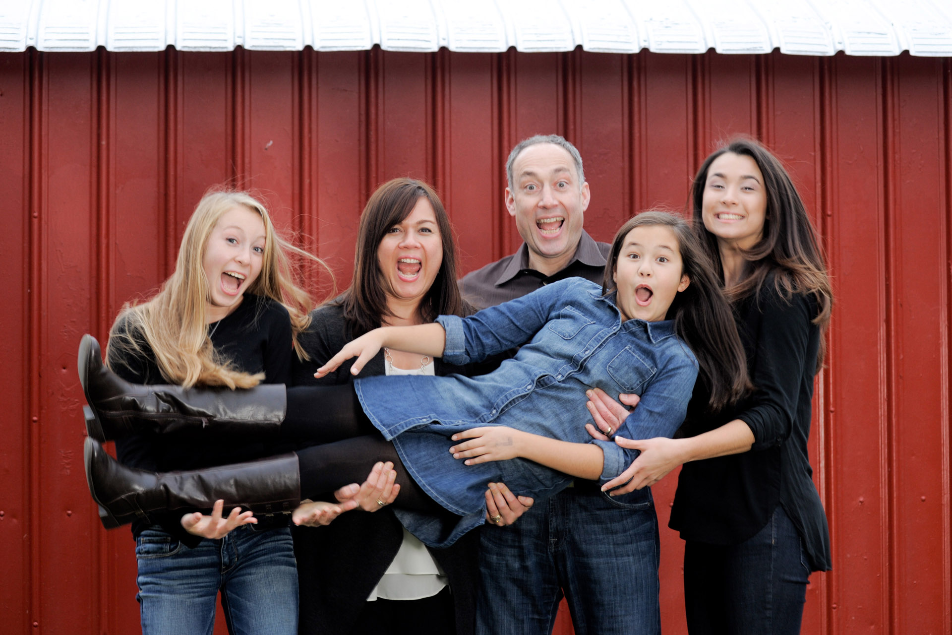 Best Detroit family photographer closes out the family session with a goofy and fun family photo as they 