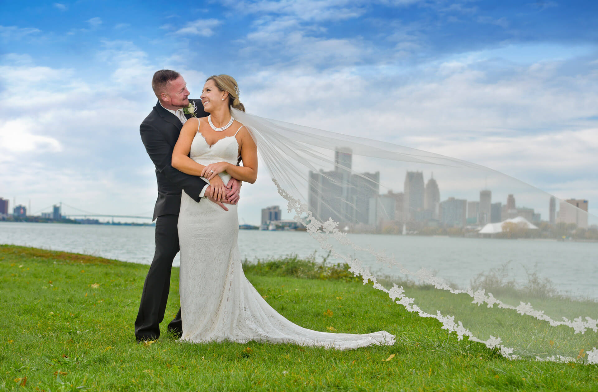 Epic Wedding portrait showing the bride and groom at the point on Belle Isle after their wedding on Belle Isle in Detroit, Michigan.