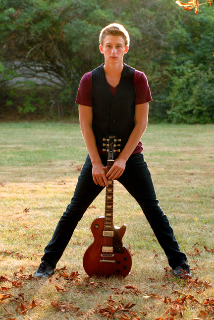 Michigan Troy senior pictures shot with props of your choice, like guitars