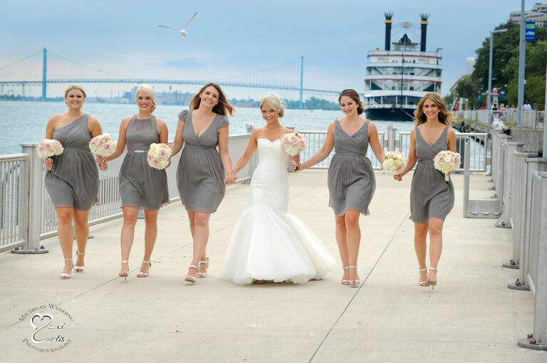 Bridesmaids stroll on the dock at the Waterview Loft during an earlier wedding.