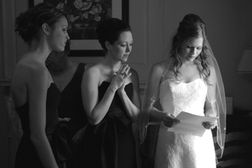 The bride reviews her vows before her Dearborn Inn wedding in Michigan.
