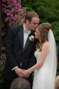 The bride and groom tear up during their Dearborn Inn, MI wedding ceremony.