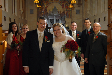 bridal party is exiting the chapel at St. John's in Plymouth, MI wedding.